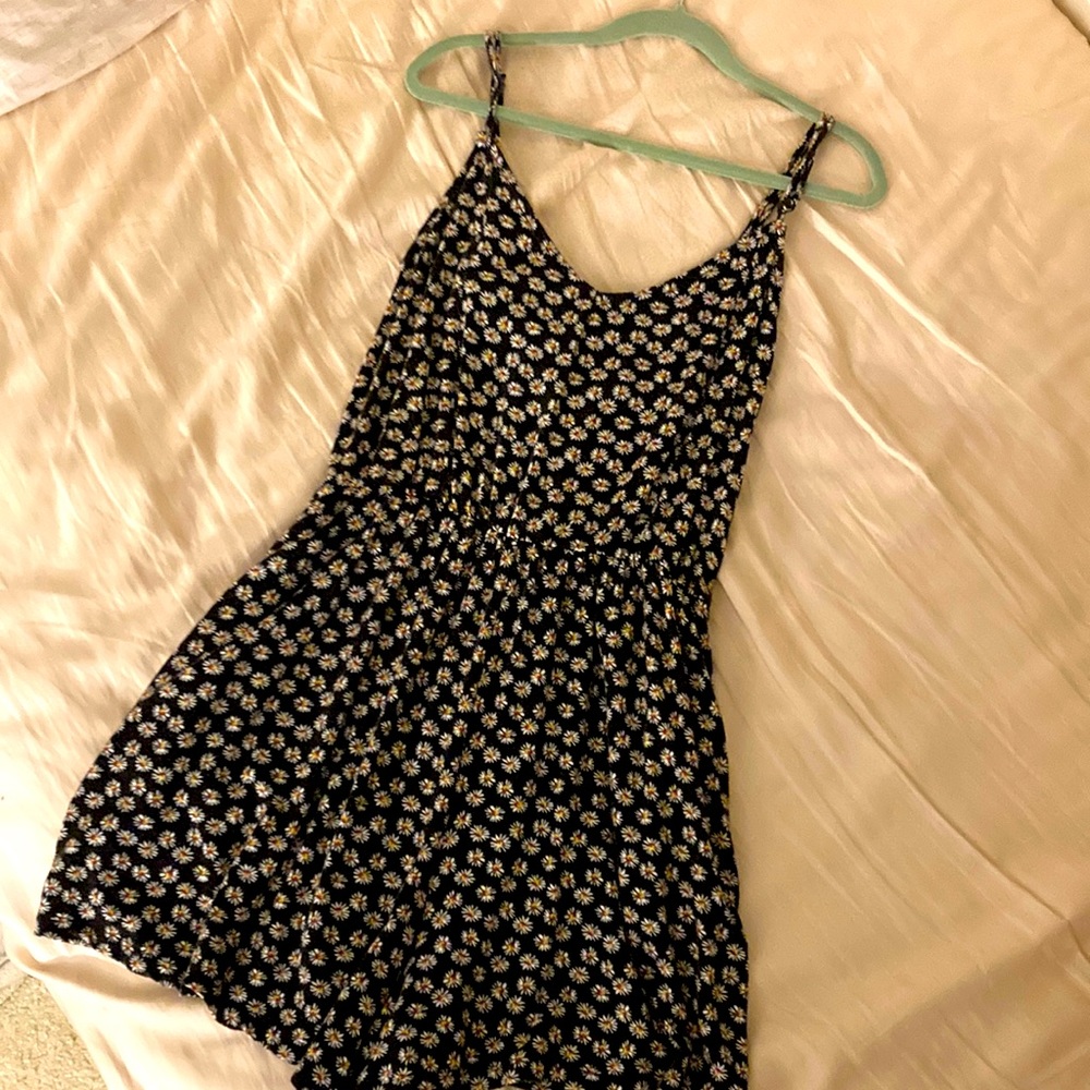 Black romper with white flowers